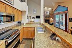 Granite counters throughout the kitchen